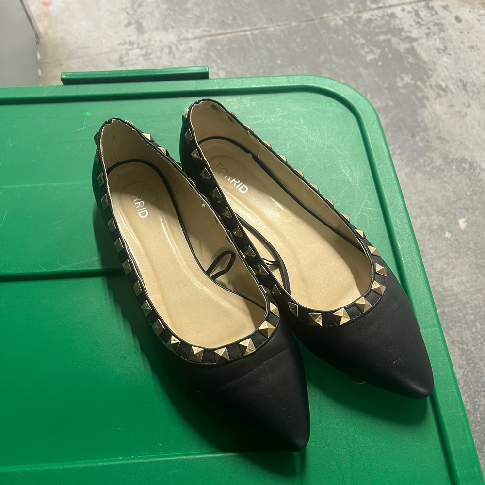 Black studded slip on